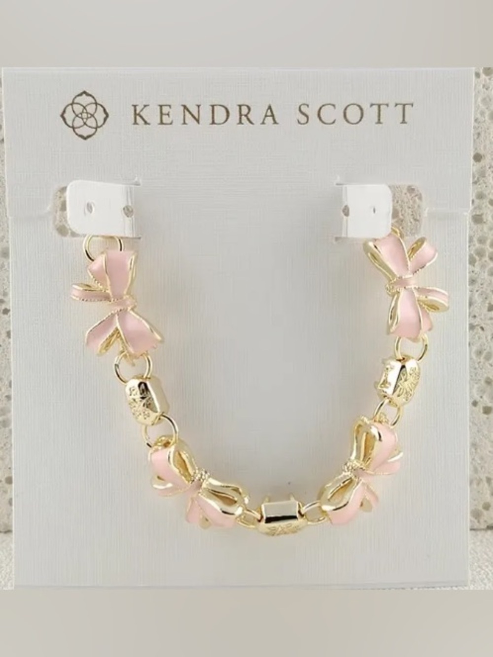 Kendra Scott Pink Enamel Bow Link Bracelet in Gold Tone